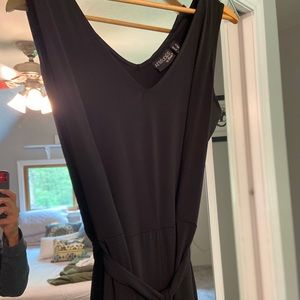 Black sleeveless jersey belted jumpsuit